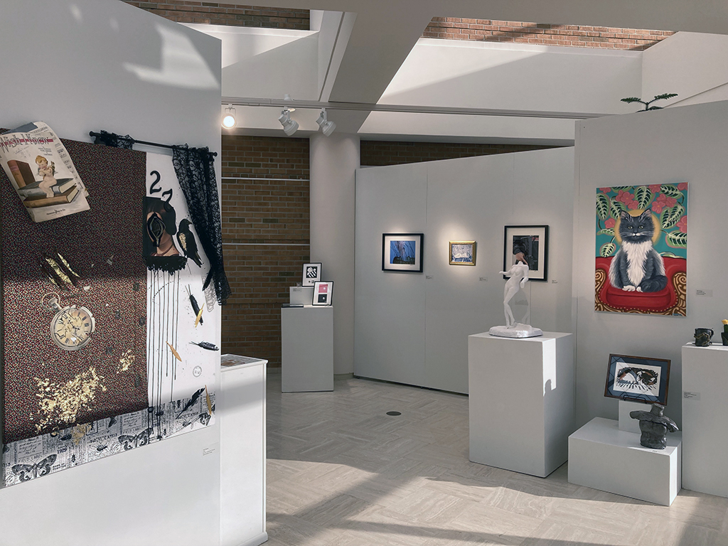 17th Annual Art Student exhibition back wall various artworks shown.